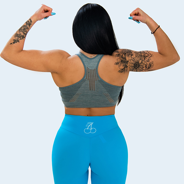 Grey sports bra with removable pads and holes - Image 4